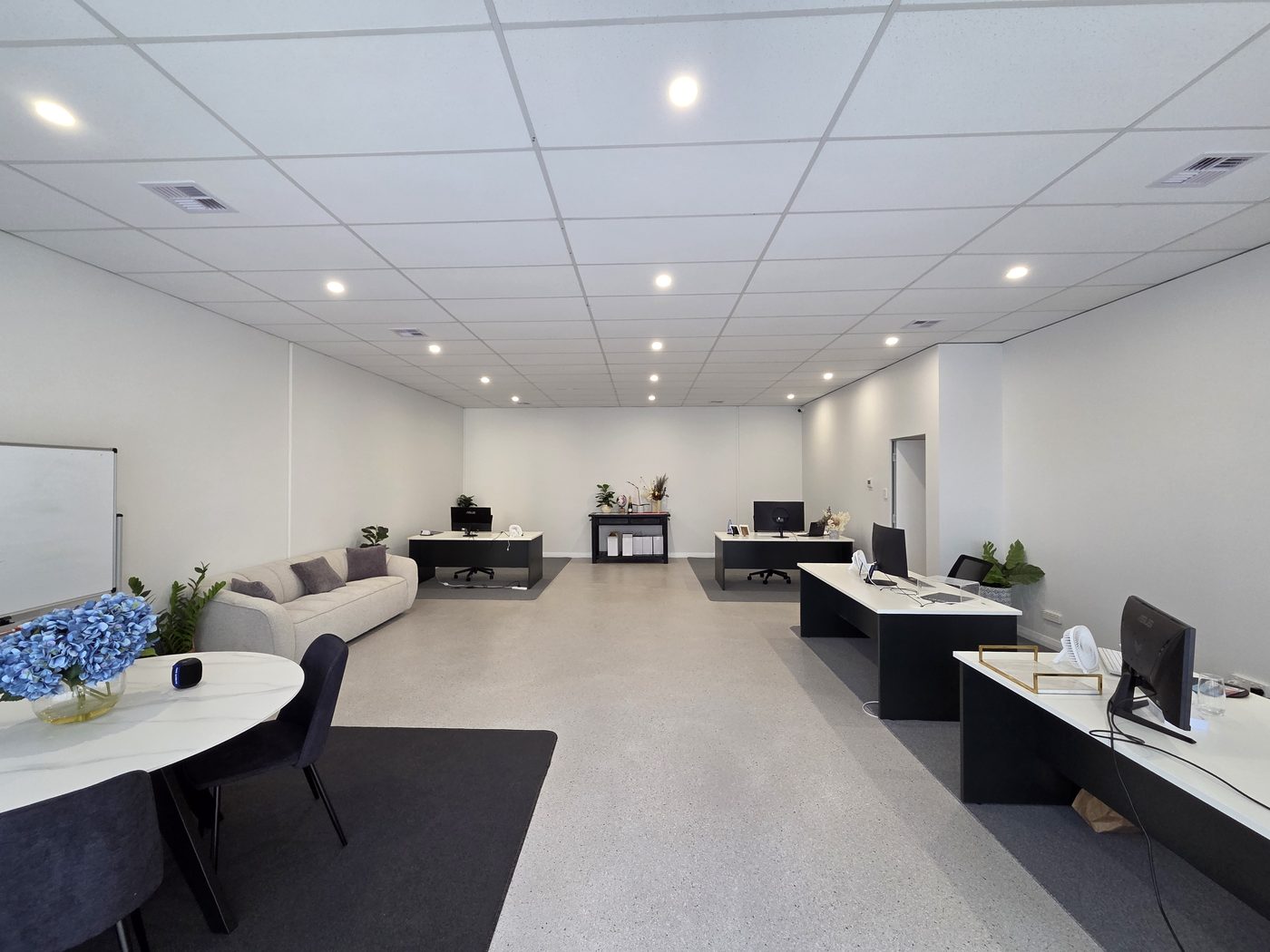 Office fit-out with recessed downlights and power points