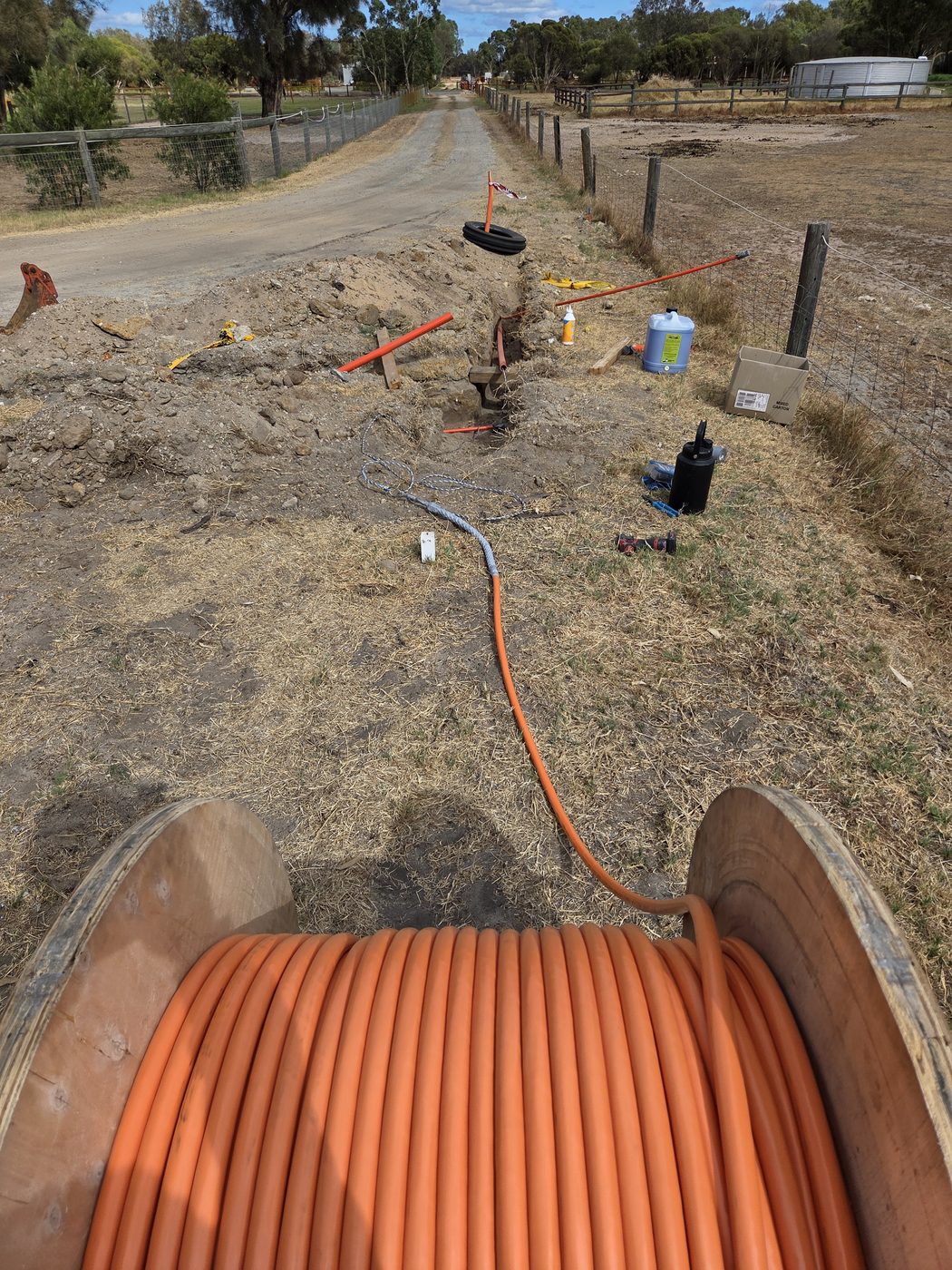 Submain trenching and conduit run on a rural property